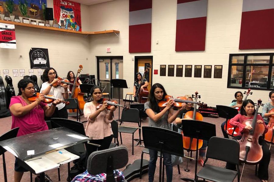 The parent-teacher orchestra meets every Wednesday from 6:30 p.m. to 7:30 p.m.