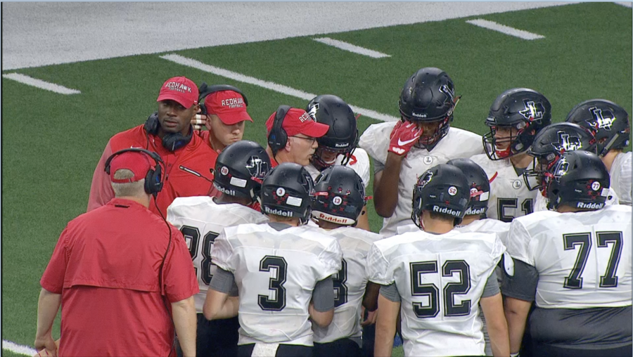 Talking to the offense during a timeout during the 2018 game against Centennial at the Ford Center, former offensive coordinator and new head coach Matt Swinnea hopes the the team improves on last years winless season. The Redhawks open the 2019 season with a scrimmage against Royse City on Friday. 