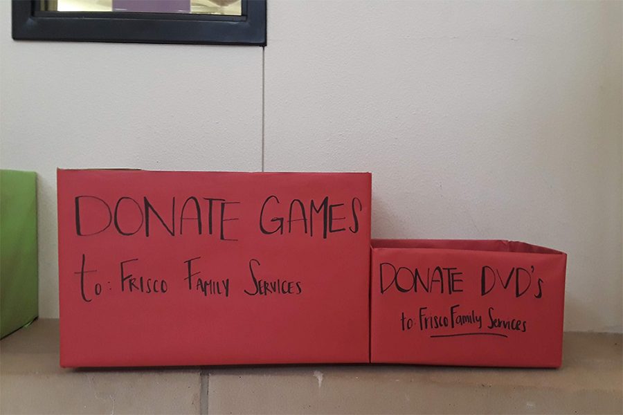There are boxes in the rotunda for students to drop off games and DVDs for Frisco Family Services. The drive will continue until November 14th.