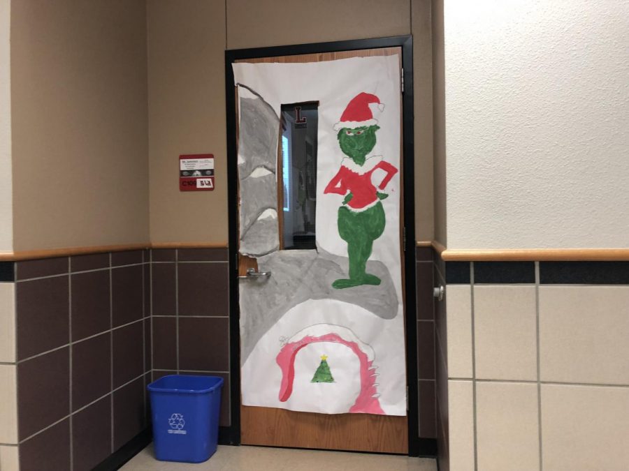NHS provides students the chance to spread the holiday spirit to school by decorating teachers doors. 