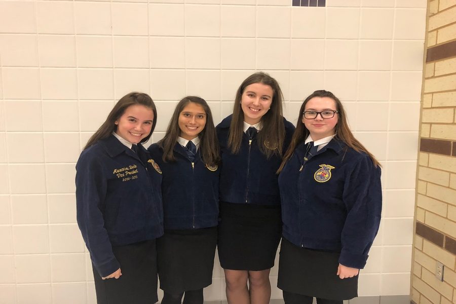 Sophomore Rachel Wilson, sophomore Thais Fernandez, senior Sophia Garofalo, and sophomore Olivia Christian (left to right) claimed first in the Future Farmers of America Public Relations competitions on Tuesday at Anna High School. 
