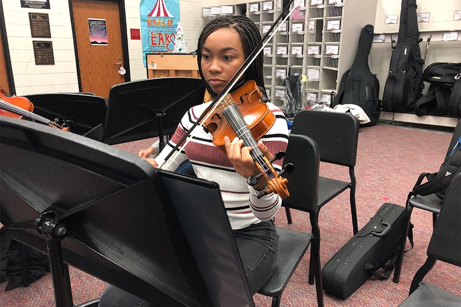 In addition to performing with Red Rhythm on Tuesday and Wednesday, freshman Melia Terry will also be playing the violin with the orchestra. 