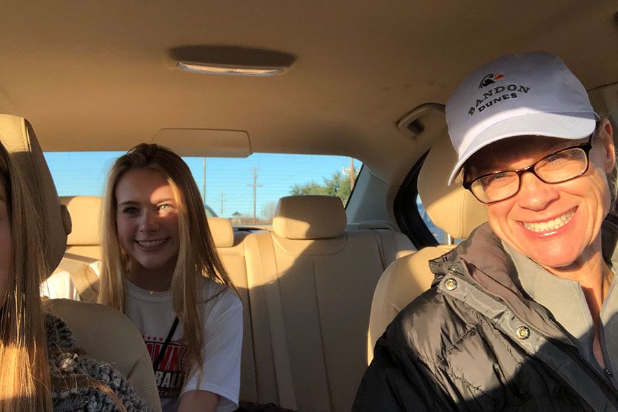 Waiting for her chance to take the wheel, freshman Allie Lynn sits in the backseat behind mom Colleen Lynn driving home for school. Wingspans Allie Lynn shares her thoughts on being a 15 year old in high school.