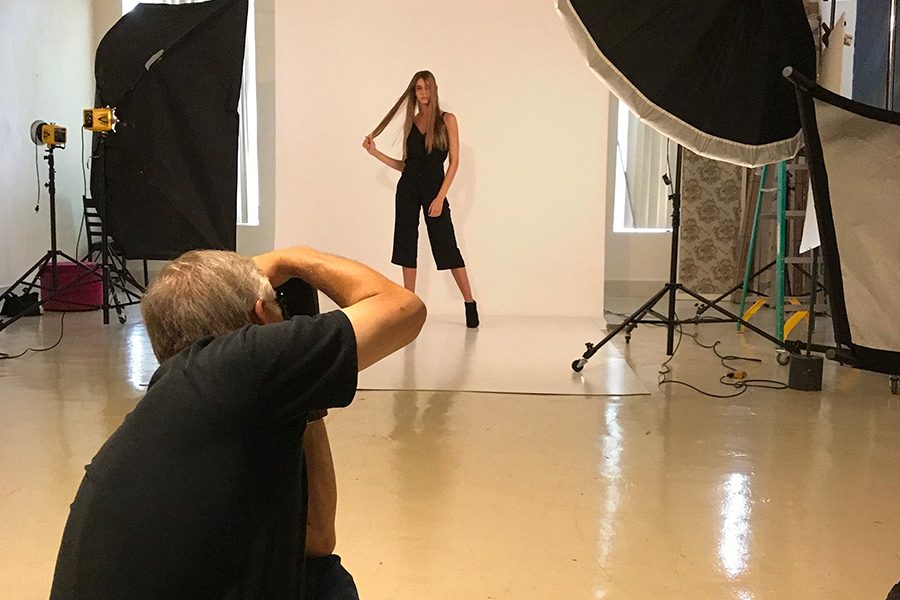 Standing in front of a white screen, junior Elissa Williams takes part in a photoshoot. 

If things go as planned, Williams will graduate early to pursue a professional modeling career. 