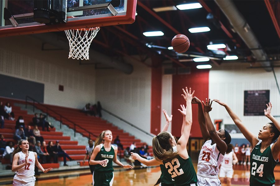 Senior+Randi+Thompson+%28%2323%29+puts+up+a+shot+against+Lebanon+Trail+defender+on+Tuesday%2C+Jan.+8+2019.+Redhawks+carried+their+success+into+Tuesday+nights+game+winning%2C+70-36.