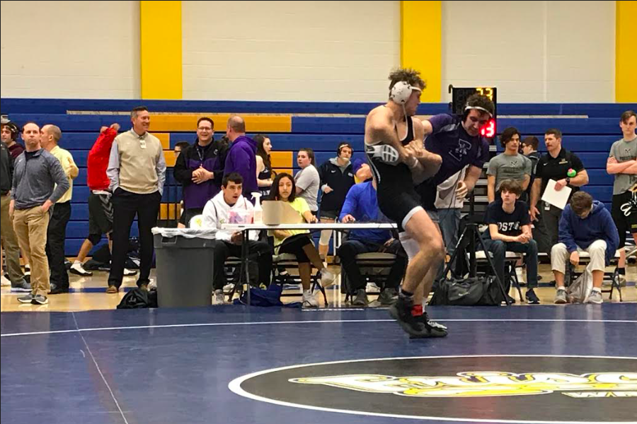 With boys wrestling claiming second overall, senior Austin Widner left the gym getting gold for the first time in a varsity tournament on Friday and Saturday.