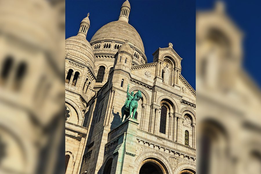 The Basilique du Sacre-Coeur de Montmartre, one of the highest points in Paris, a city with many food options for everyone.