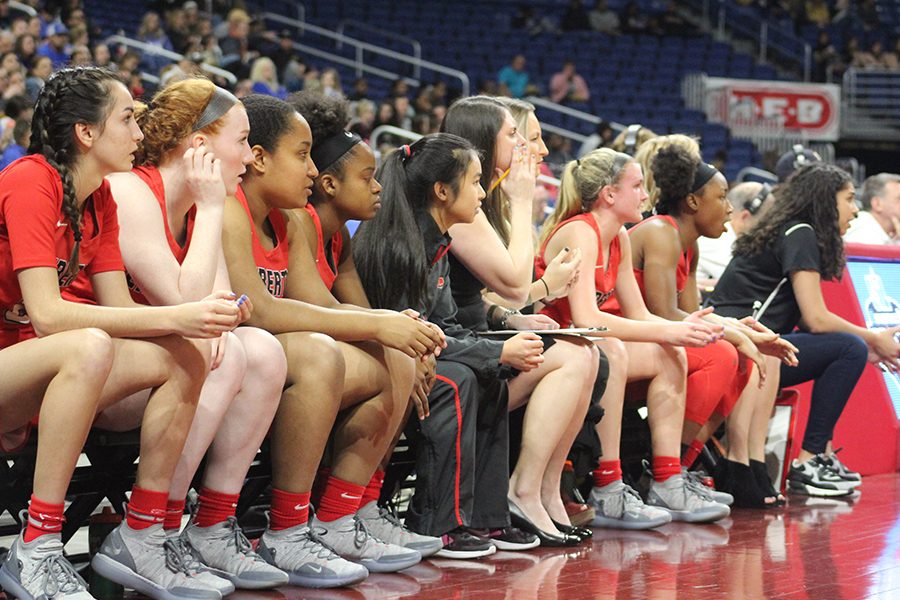 The Redhawks bench looks on during Thursdays state semifinal game against Kerrville Tivy in the Alamodome. Tied at 27 with six minutes left, the Redhawks would only give up one more point and win 34-28. 