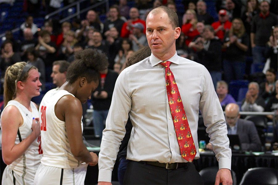 Coach Reedy looks onto the court as the team loses 47-42.  
Weve always pride ourselves and being really mentally tough and theres probably no other group in the past nine years that has been this mentally tough,” he said.