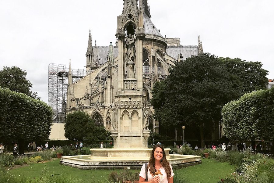 Traveling throughout Europe in the summer of 2018, AP U.S. History teacher Emily Griffin stands in front of Notre Dame. “As a history teacher, and as somebody who appreciates history, its hard to see something so easily collapse thats been around for years and has been so symbolic, Griffin said. 