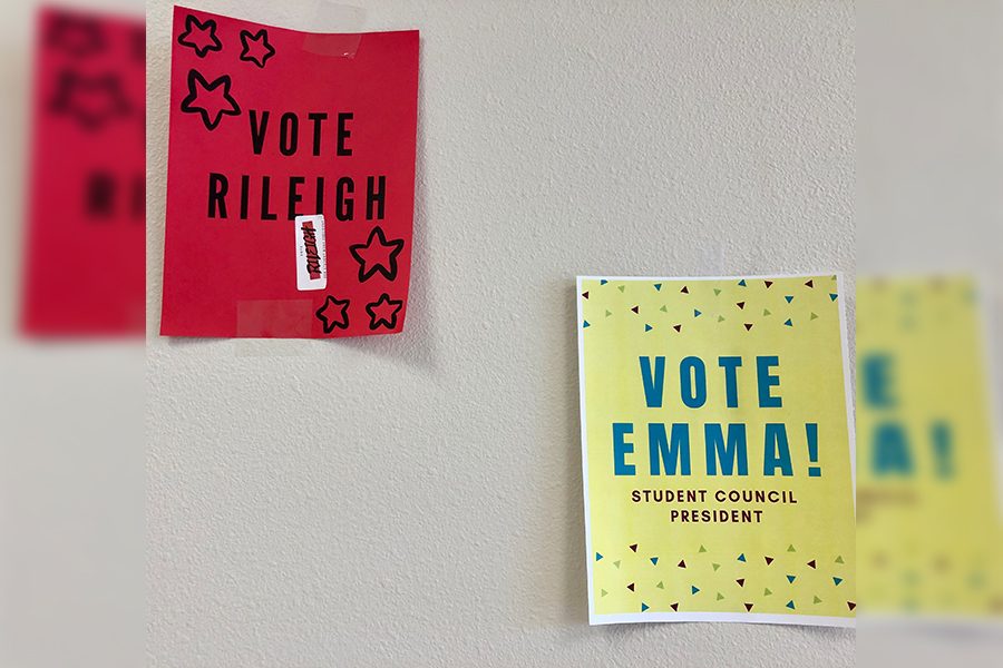 Campaigning for StuCo, the candidates have posters all over school. Two female students are running for the student council presidency for the first time in four years.