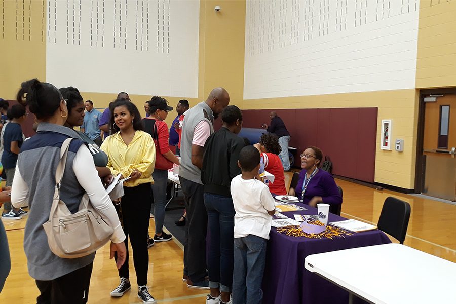 FISD families talk with representatives of various colleges at the HBCU College Fair on March 28 to learn more about their desired school. 
