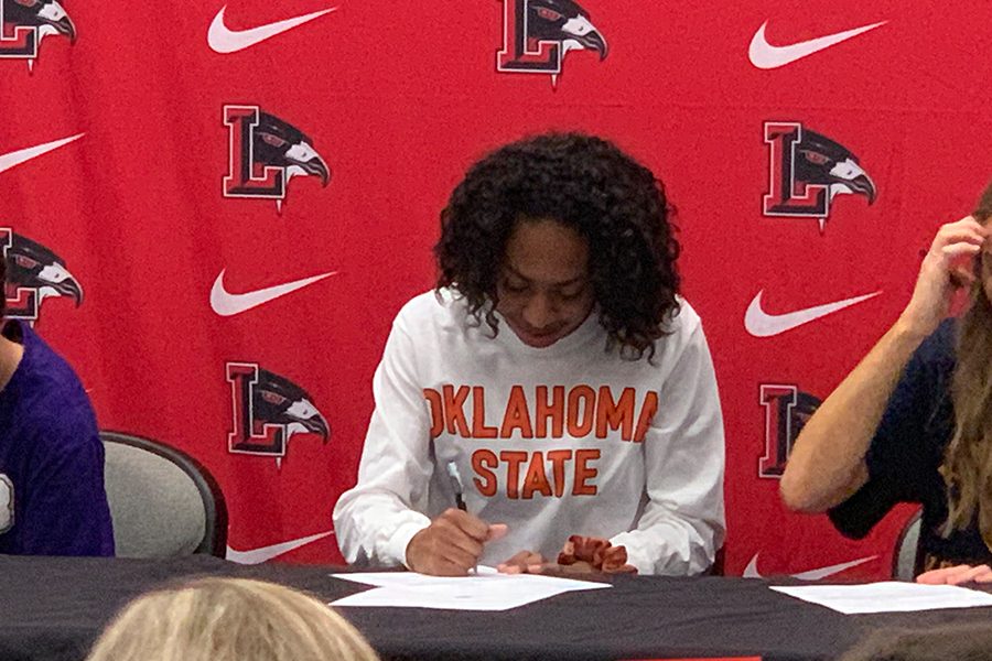 Track+and+field+athlete+Sanye+Ford+signed+a+National+Letter+of+Intent+to+continue+her+athletic+career+at+Oklahoma+State+University+at+a+Signing+Day+Ceremony+Friday+in+the+lecture+hall.+