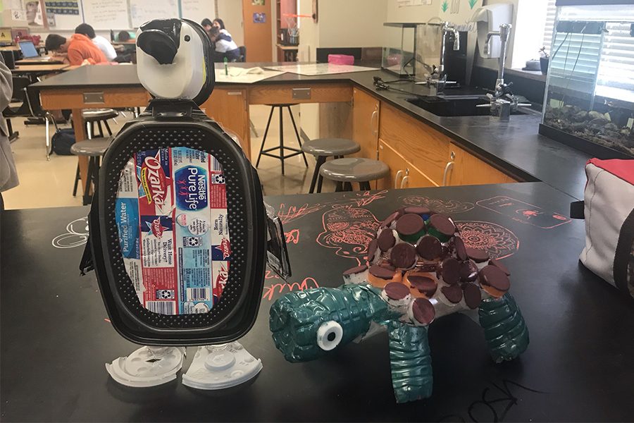 The plastic animals pictured are part of a Family Science Night project aiming to combat plastic pollution. Students from all types of science classes created presentations to teach children and their families about concepts they learned this year.