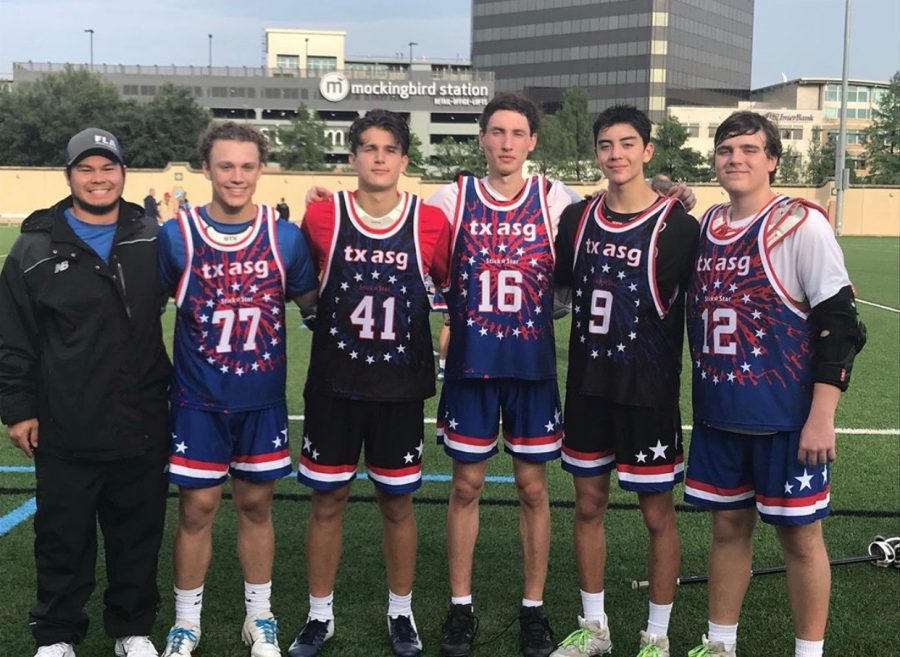 Second to the left, senior Austin Widner participates in a Frisco ISD lacrosse game.