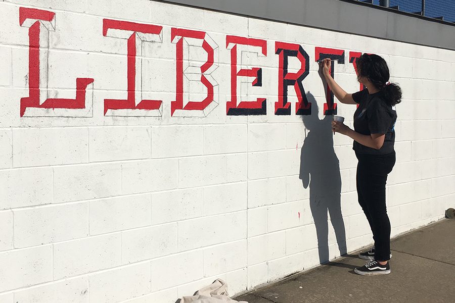 National Art Honor Society has taken on a new project of repainting the softball dugout. The students will finish their painting on Monday, May 13, 2019.