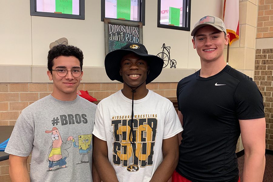 Wrestling athlete Precious Essien signed a National Letter of Intent to continue his athletic career at University of Missouri at a Signing Day Ceremony Wednesday in the library.
