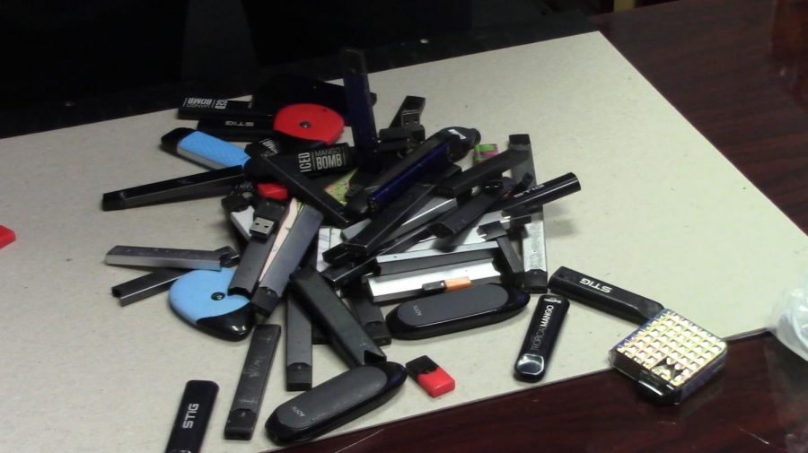Pictured is a collection of the confiscated vapes in Officer Glenn Hubbards office. Vapes from across campus have been collected by teachers and administration to help lessen the epidemic. 