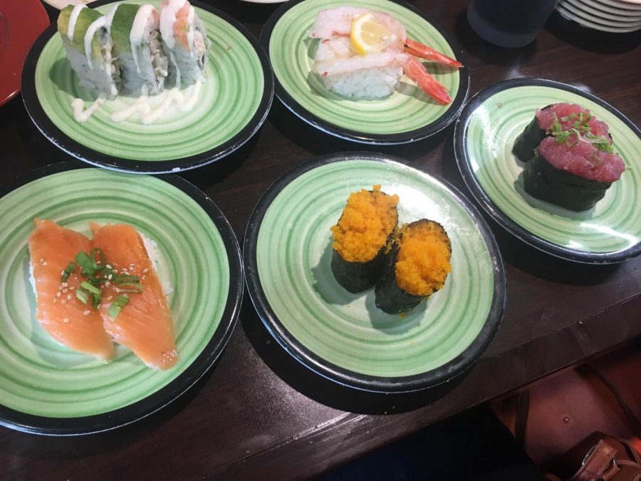In this weeks culinary crusade, Kanz visits Kura Sushi, a restaurant with a revolving sushi bar. Patrons can pick whatever sushi they want by pulling it off a revolving built or ordering it on a tablet.