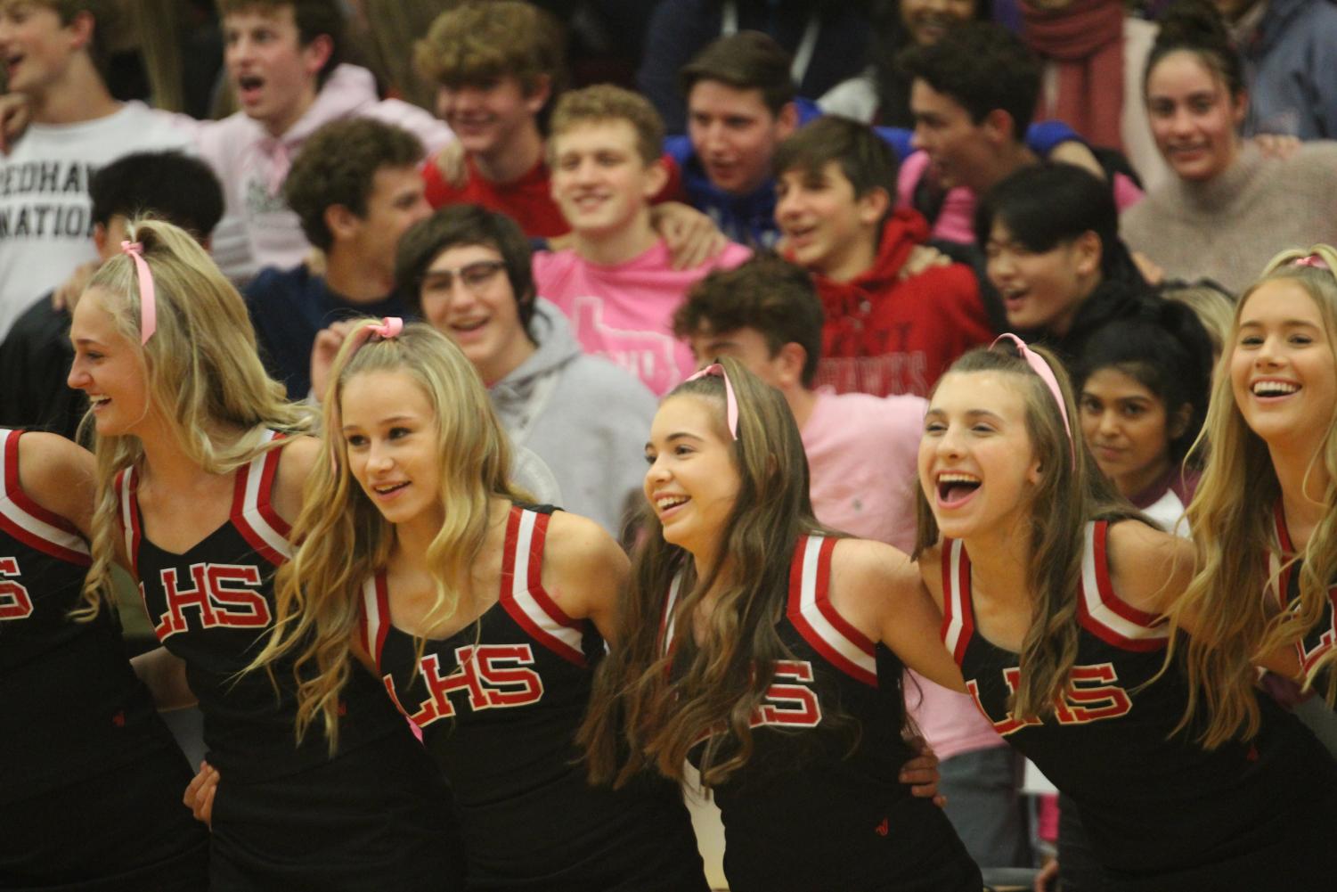 Pink temporarily replaces red and black at pep rally