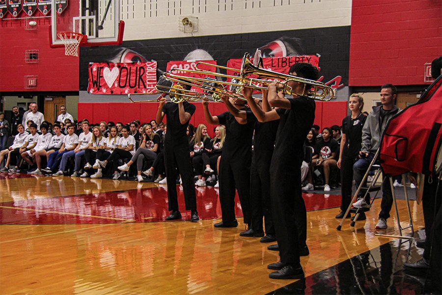 Pictured: trumpet section sounds at previous school pep rally. Having begun this Tuesday, band students are gathering for a visual camp in order to prepare for next years marching season. Rehearsals will be held after school in the big gym, and will introduce incoming freshman to the inner workings of the Redhawk band.