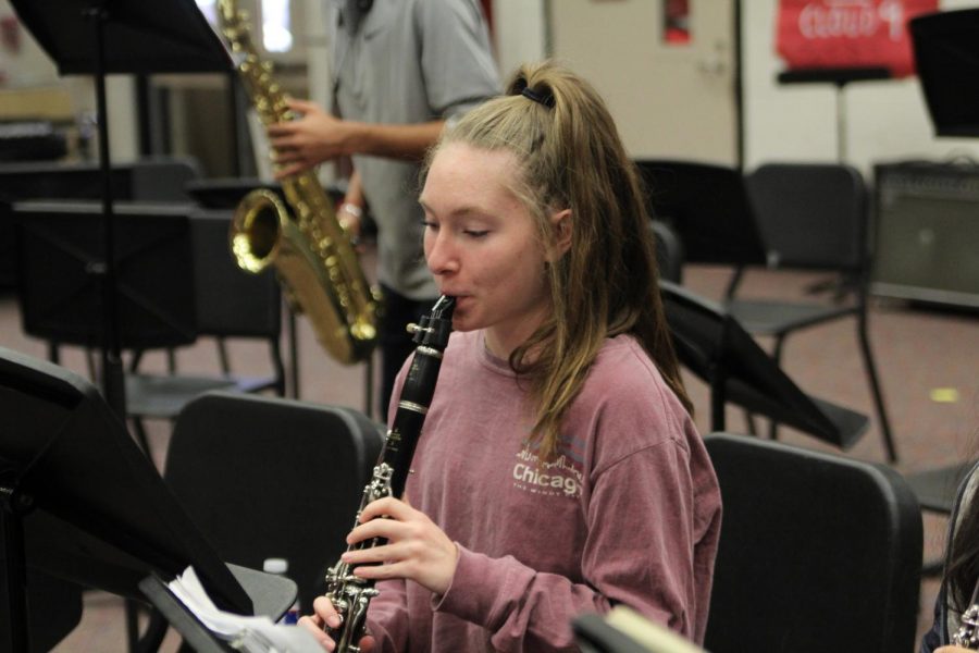 Senior Lindsey Jobe practices playing her instrument in the band hall. She is preparing for All Region auditions, which takes place for all band members Saturday at Plano Senior High School. 
