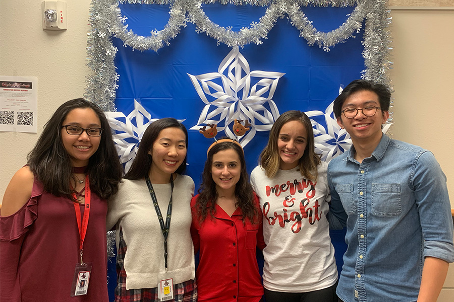 Former officers Isabella Pedron, Jessie Rho, Sarah Kleyman, Amelia Jauregui, and Donnie Pham pose at the Best Buddies winter party last year. Jauregui is the current president of the  chapter club on campus and led in the planning of the winter party taking place on Thursday. 