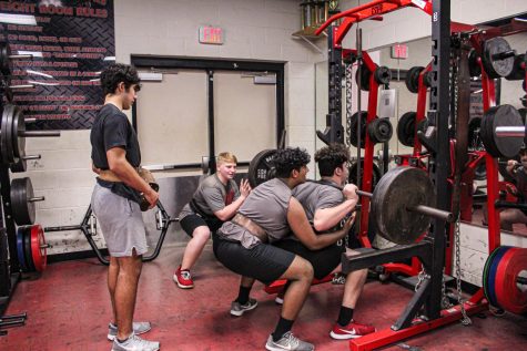 Preparing for the final meet of their 2022 season, powerlifting begins preparations for their final regular season meet. With junior Preston Mealy spotting his partner, the team is back in full force after a snow and ice delay.
