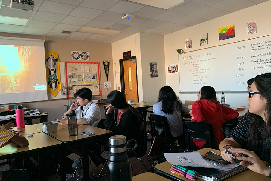 Studying the fundamentals of a synthesis essay, students listen to AP Language teacher Swapna Gardners instructions. With the news project, students have a chance to understand the different perspectives involved in a topic of their choice.