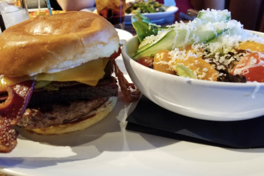 The Hamilton burger from Local Yocal features  ⅓ Ib of house-ground wagyu beef, brisket, jalapeno cheddar sausage, bacon, cheddar cheese, grilled onions, mayo, and jalapenos. Wingspans Haille Hughes gives her thoughts on this barbecue restaurant.