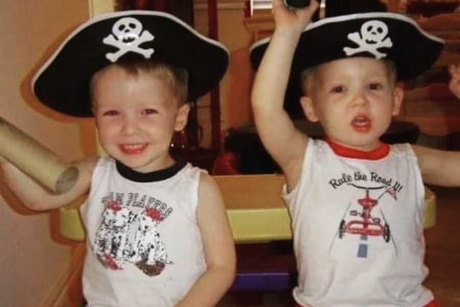 Wearing pirate hats, the twins get their picture taken as toddlers. “At first the expectations were the same, we did everything together and with relatively the same skill,” Michael said. “But as we’ve grown older our parents have accepted that we have different talents and needs, and they have begun to treat us accordingly. Our parents push us to succeed according to what they believe we can handle.”
