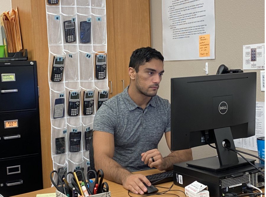 After his college academic and wrestling career, Arman Mansouri is now head assistant coach of the wrestling team and teaches Leadworthy, a leadership development class at the school. 