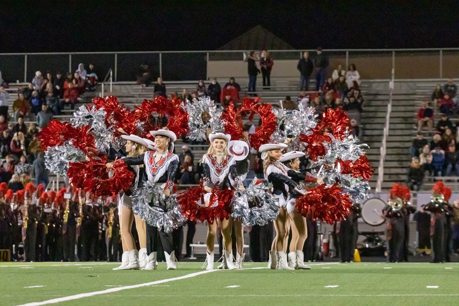 Taking their show from the football field to the competition gym, Red Rhythm will be mixing it up with new routines, including a prop and a contemporary routine. 