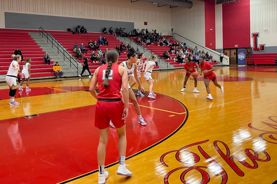 The Redhawks girls basketball team wrapped up their first round of District 9-5A play on Friday. The team stayed strong and were able to pull off a win heading into round two.