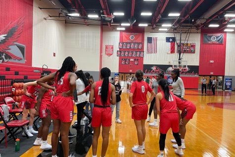 Entering Tuesdays game against Memorial High School, the girls basketball team was undefeated in District 9-5A with an 8-0 record. But after failing to score in overtime, the Redhawks fell to Memorial 37-32, leaving both teams in a tie for 1st place. 