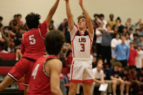 Junior Matthew Bishop (#3) and the rest of the Redhawks hope to be dialed in Friday night as they travel to take on the Frisco High Raccoons in Distridt 9-5A play. The girls team tips off the action stating at 6:30 p.m. 