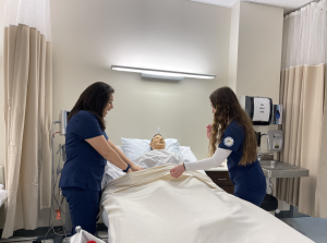 Students enrolled in the CTEs Health Science course practice patient care procedures on dummies in the Med-Tech lab. Over the course of two semesters they will learn bedside manners, blood drawing, and phlebotomy duties. 