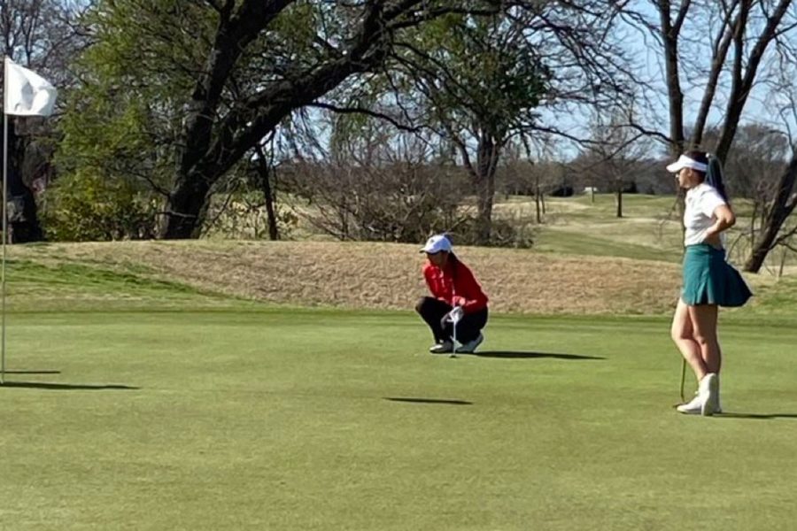 Senior Anika Patel reading her putt on the 7th green on day 1.