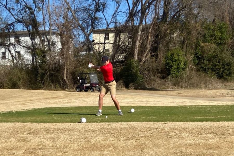 Junior Braden Cobb takes his tee shot on the par-4 11th hole. Wanting as much preparation time before districts, the Redhawks kicked off the Coyote Classic tournament on Tuesday.