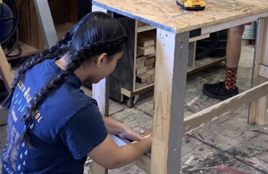 Pictured: Tech theatre student Rishika Desai get to work on new design, which she will showcase in Austin next month during her UIL design competition. 