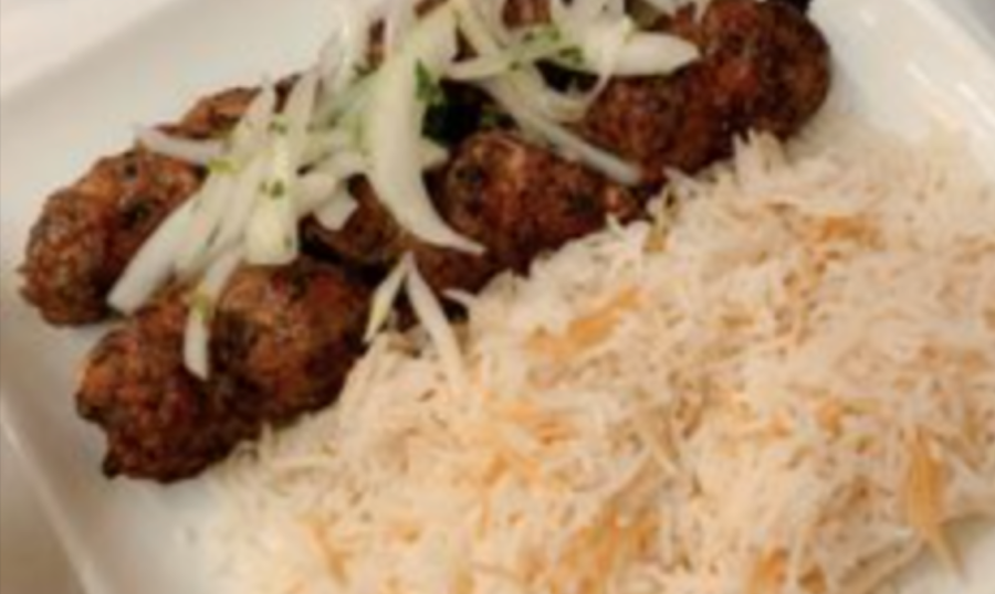 Pictured%3A+Signature+Kababs+chicken+kabab+with+a+side+of+rice.+Bringing+South+Asian+and+Mediterranean+culture+through+an+American+restaurant%2C+Signature+Kabab+%26+Grill+introduces+a+wide+variety+of+dishes%2C+scents%2C+and+colors+that+remind+one+of+home.%C2%A0Guest+Contributor+Alveena+Naeem+discusses+her+opinions+as+a+first-time+visitor+to+the+restaurant.+