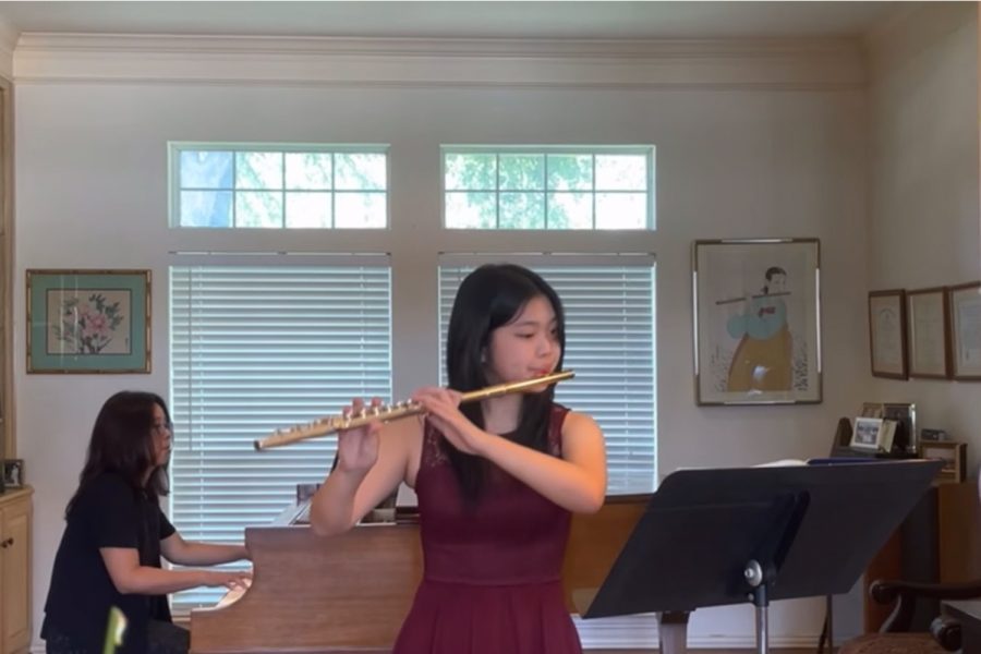 Practicing on her flute at home, junior Hannah Lee spends hours every week rehearsing her music, often with her mom Grace accompanying her on piano. Playing the role of Queen Bee in the Redhawks Marching Band contest show, Lee has earned top honors in the state. 