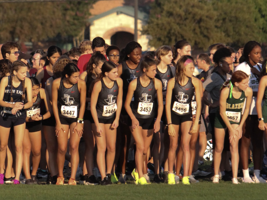 Cross+country+kicks+off+their+season+Friday+in+the+Rock+Hill+Twilight+Invitational.+The+runners+will+be+competing+in+a+two+mile+race+around+Warren+Sports+Complex.