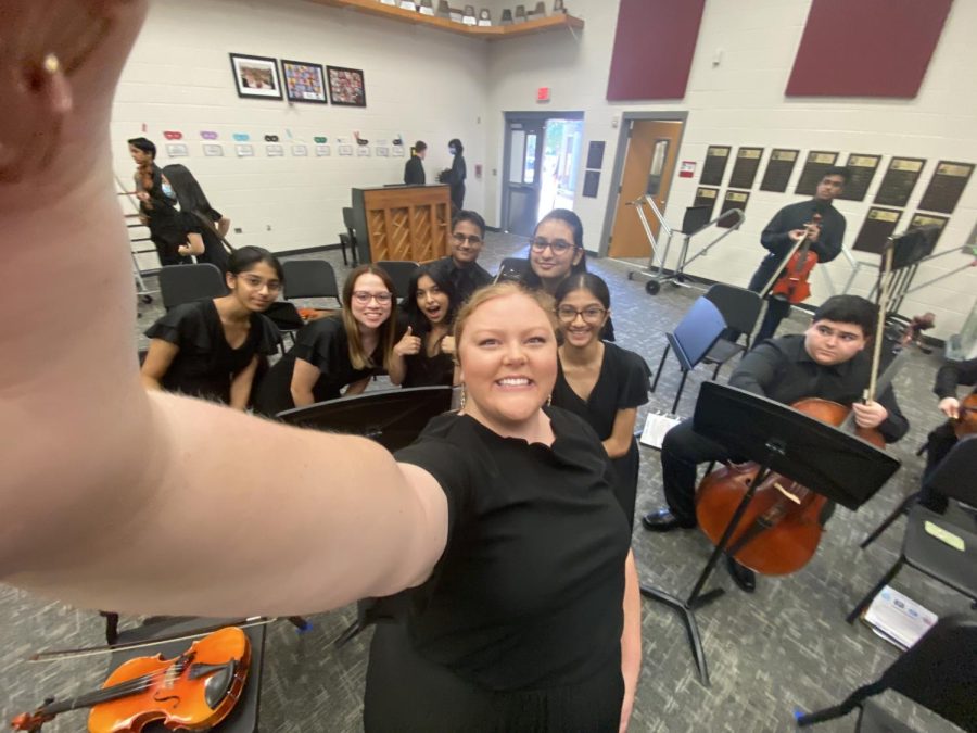 Sophomore Aswikha Karthikeyan (pictured middle) takes a selfie with her peers and orchestra director after their first concert of the semester. In this week’s edition of Artistic Expressions, Wingspan sits down with Karthikeyan as she discusses the obstacles she faces as a 4’11” viola player.