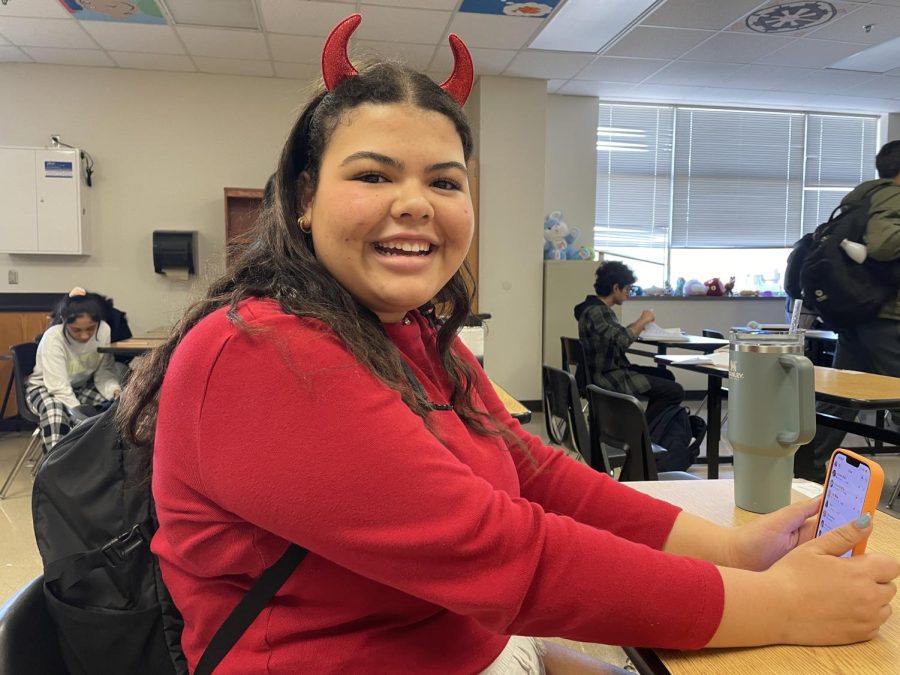 The opportunity to wear costumes also connected students with friends. Junior Sadie Johnson (pictured) participated in a partner costume, being the devil to her friends angel.