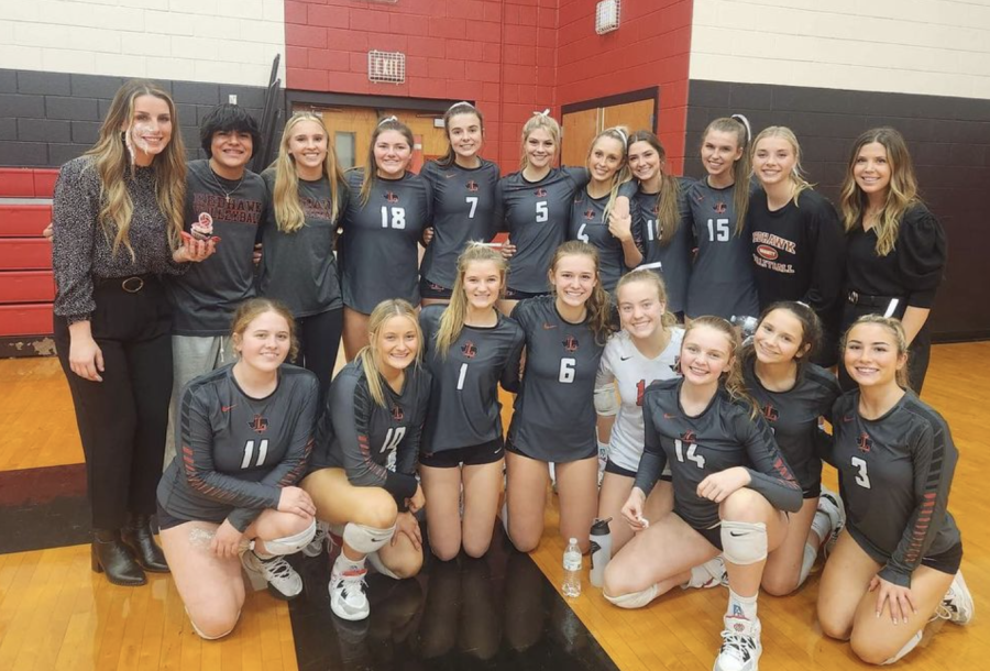 First+year+volleyball+head+coach+Eighmy+Dobbins+led+her+team+to+first+in+District+10-5A+and+continues+to+lead+them+through+their+playoff+run.+The+teams+success+is+no+suprise%3A+they+share+a+bond+with+their+coach+like+no+other.