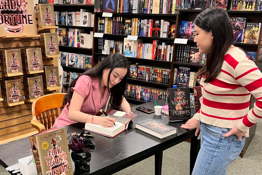 Sophomore Christine Han meets the author of Foul Lady of Fortune, Chloe Gong at book signing. Thanks to the popularity of BookTok, Han and many other students have discovered a passion for reading