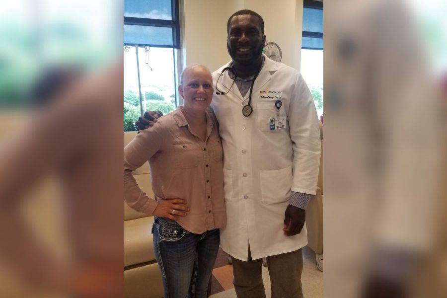 Heather Whitcomb smiles with her oncologist Tobi Nwizu on her last day of chemo. Ever since she felt her lumb five years ago, her life instantly changed as she was struck with the news that she had invasive ductal carcinoma breast cancer.