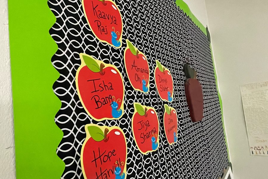 Awarding achievement, debate teacher Michelle Porter uses apples as a reward system for debate students. Once a month, students have the chance to be added to the apple wall.