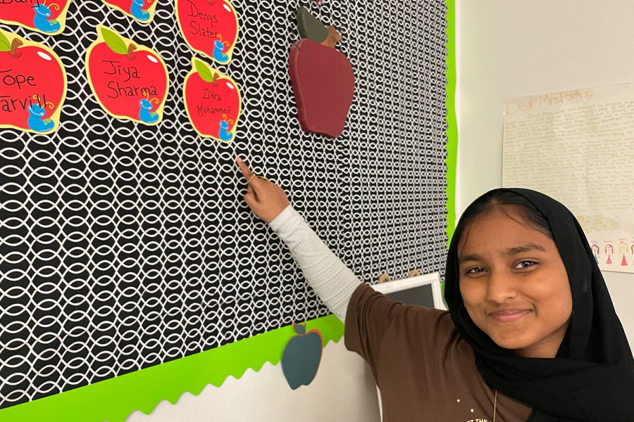 Every month, Porter selects one student from each of her classes who meets her criteria and places an apple with their name on the apple wall. Now, her students are well aware of what Porter is looking for. 
